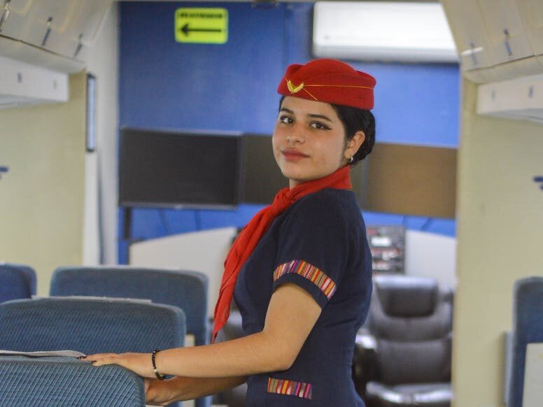 portrait of a flight attendant in a plane