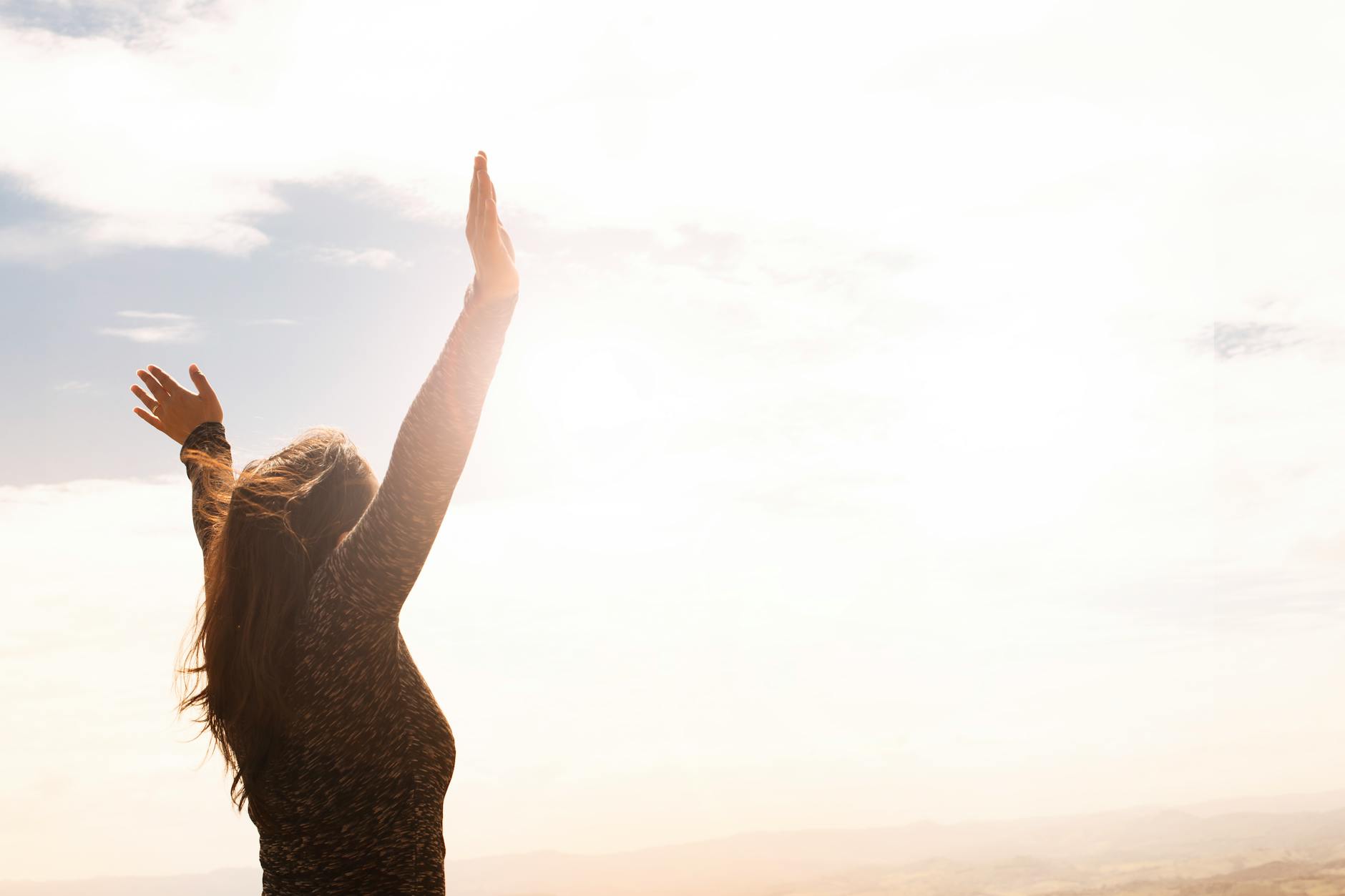 freely
photo of woman raising both hands
